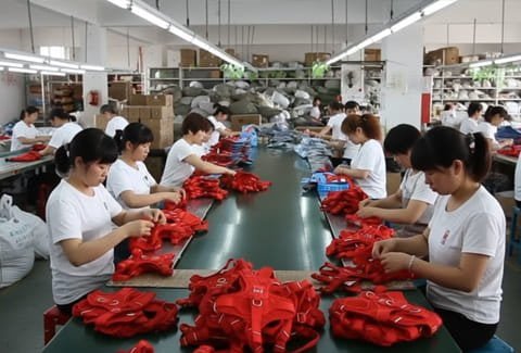 Team at work on production line