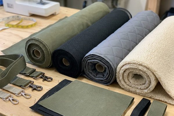 Pet carrier fabric cost analysis and quality comparison Pet bag material samples comparison